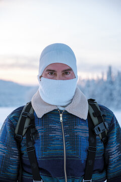 Exploration in Akaslompolo Village during a serene winter sunset in Lapland, Finland