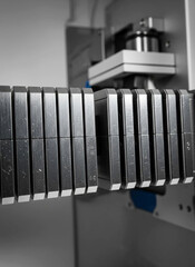 Closeup of industrial metal gear components and machinery parts