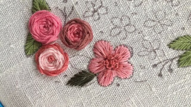 Fishbone stitch leaf embroidery tutorial. Close-up hand stitching realistic leaf shape with angled threads on fabric. Step-by-step botanical embroidery technique for beginners, Part 3