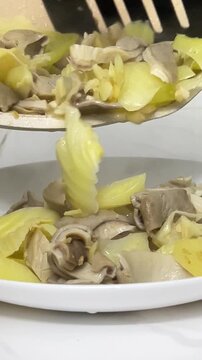 Stir fried pickled mustard greens with pock stomach and garlic