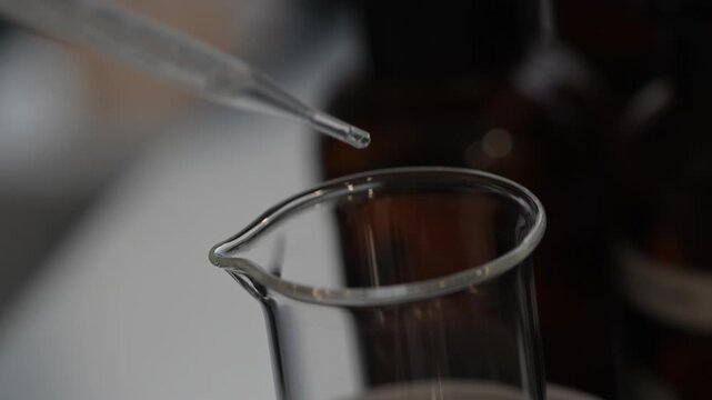 Perfume making process of dropping raw materials and blending into a flask