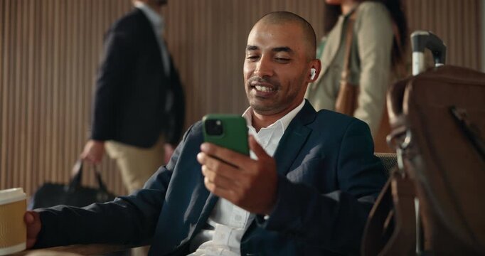 Businessman, lobby and video call with phone, suitcase and smile for travel and chat. Male person, happy and greeting with hello, accommodation and conversation for virtual meeting on work trip