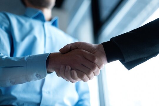 Partnership, teamwork and shaking hands for agreement, consulting or introduction in meeting