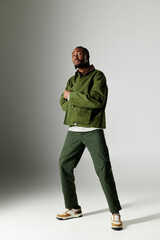 Plakat Young gentleman showcases his unique style in an elegant urban setting