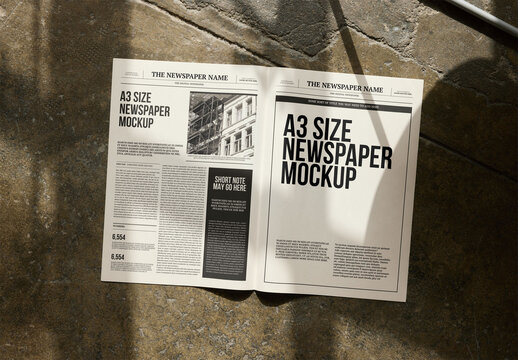 Mockup Of Customizable Open A3 Newspaper