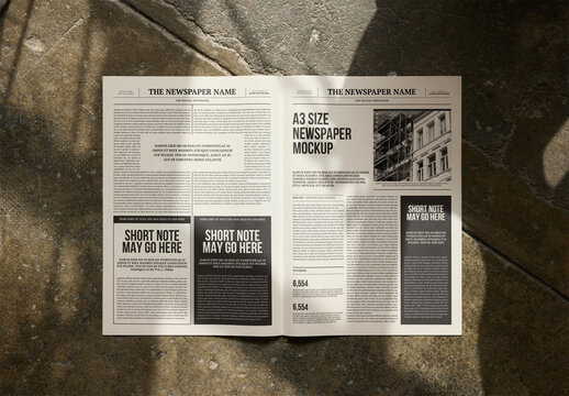 Mockup Of Customized Open A3 Newspaper