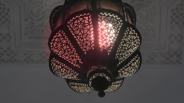 Traditional Moroccan lantern with ornate design, decorative artistry lighter, oriental lamp, detailed patterns and cultural african craftsmanship, intricate metalwork, warm spectrum