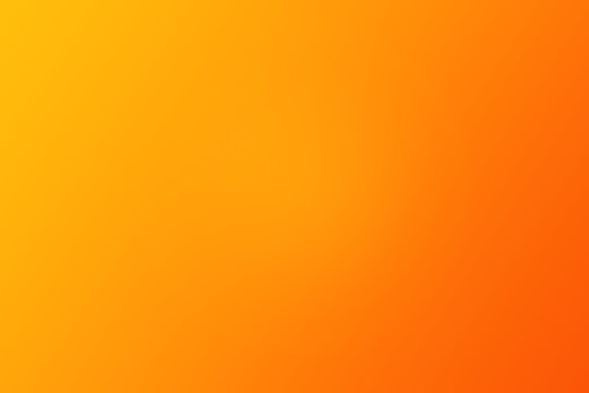 Vibrant abstract background featuring a warm gradient blend transitioning smoothly from bright yellow to deep orange tones