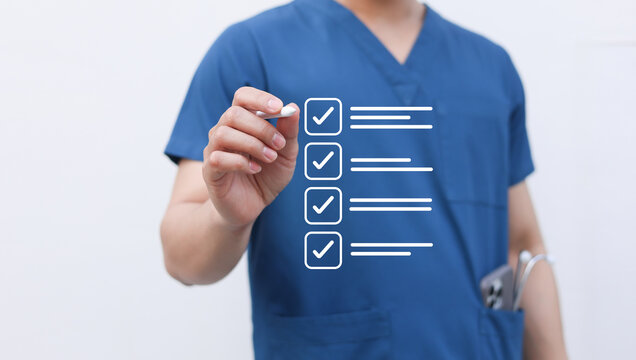 close up young general practitioner hand use stylus pen to check box on medical checklist or opd record to read and diagnose and assess about patient's symptom for healthy and lifestyle concept