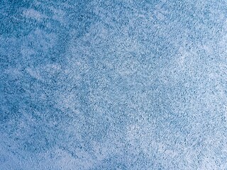 Obraz premium A blue and aqua abstract hand painted background. It is made with acrylic paints. A refreshing background painted in blue. Blue abstract painting background grunge stained, canvas texture.