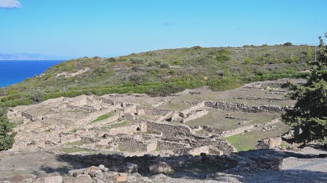 Ancient stone ruins and pathways at Kamiros on Rhodes island in Greece