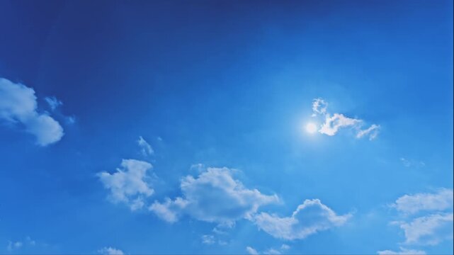 爽やかな冬の青空と流れる白い雲｜希望を感じさせる光の筋と開放的なスカイスケープ
