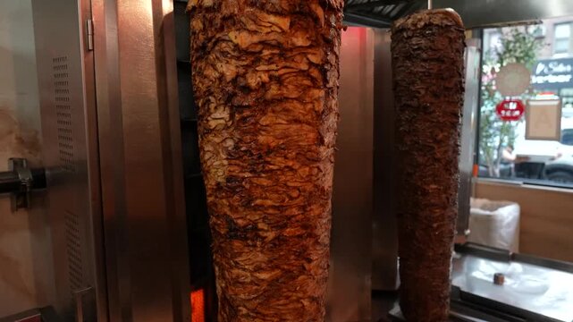 Shawarma Meat Rotating on Vertical Grill &ndash; Traditional Middle Eastern Food