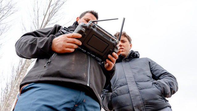 Farmers using agricultural drone for sustainable farming