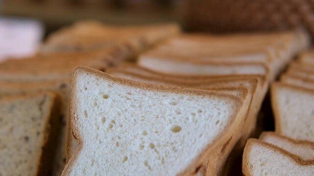 Artisan Batard Sourdough healthy Bread with leaf scoring. Open crumb high hydration Sourdough bread set on table.