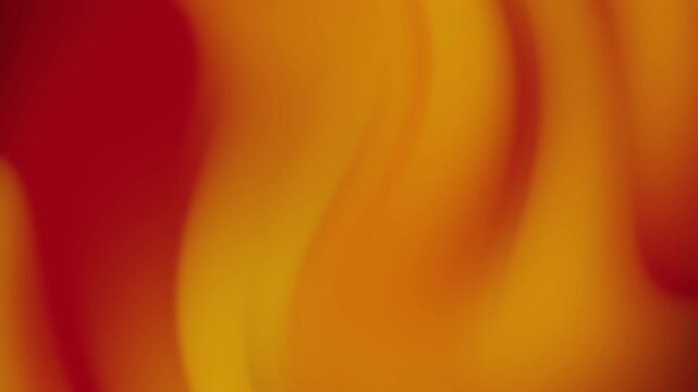 A vibrant and dynamic abstract background in shades of orange and yellow. Perfect for websites, presentations or creative projects needing a warm, ene