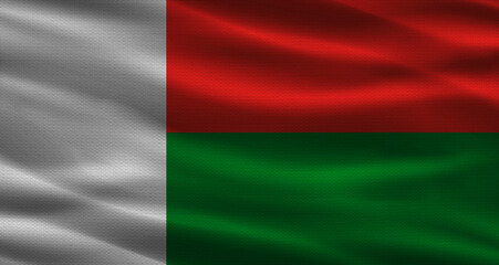 Obraz premium Malagasy flag with fabric texture. Realistic flag of Madagascar waving