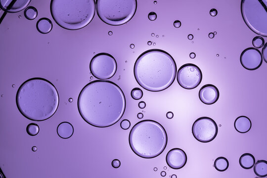 Macro capture of round bubbles on purple background