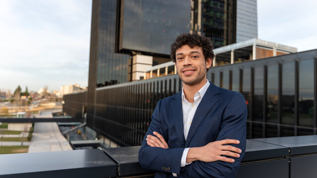 Confident professional posing in urban environment