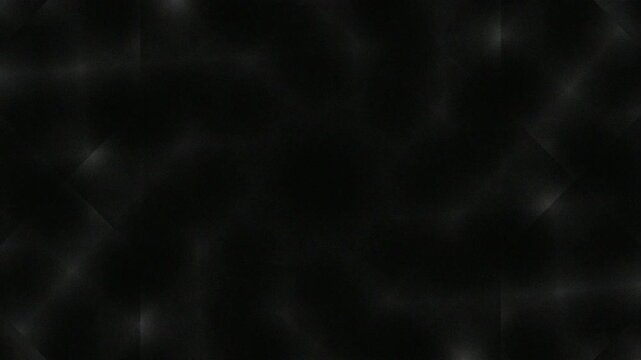 Abstract black circular pattern with glowing edges and blurred background