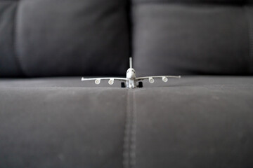toy airplane model on the sofa