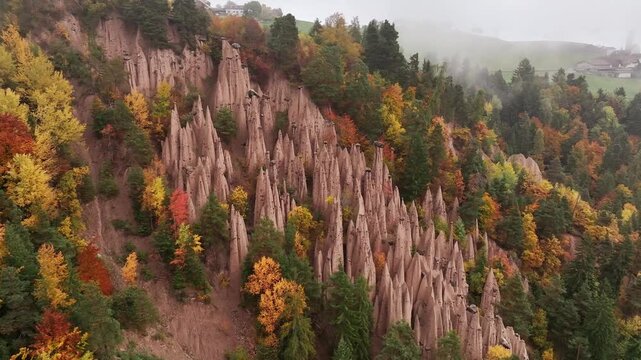 Earth pyramids of Platten at daytime, aerial view, at autumn season time.