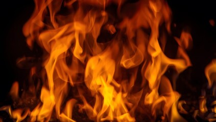 Intense Flames Dancing in a Dark Background with Glowing Light