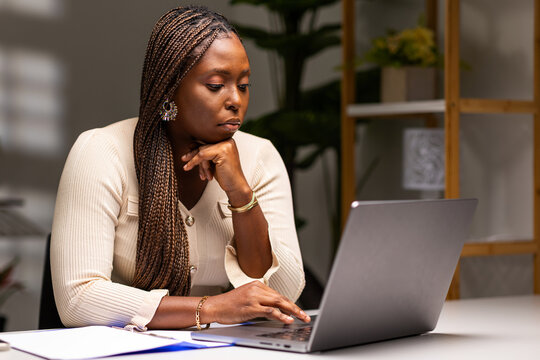 African startup business owner working from her home office