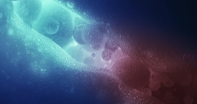 Slow Motion Macro Of Dark And Light Molecules In Liquid. Abstract Science Macro Scene