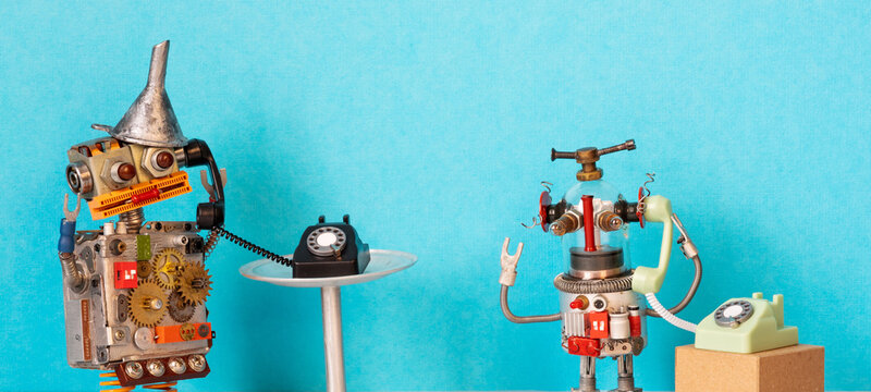 Robot telephonists speaking on old rotary handsets. Customer service flyer, helpdesk leaflet, communication card