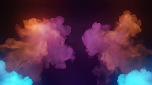 Colorful smoke clouds billowing on dark background for creative background