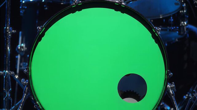 Bass drum with green screen head on stage for chroma key compositing