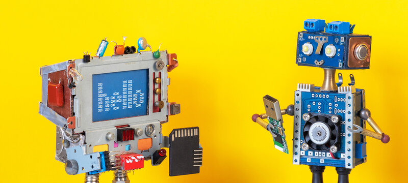 Computer robot presenting memory card, opposite robot with usb flash. Tech collaboration concept, data sharing poster, innovation banner