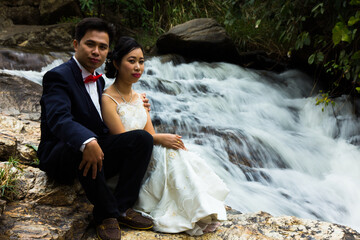 Portrait Wedding on huge Mae Ya waterfall Wedding in Asia