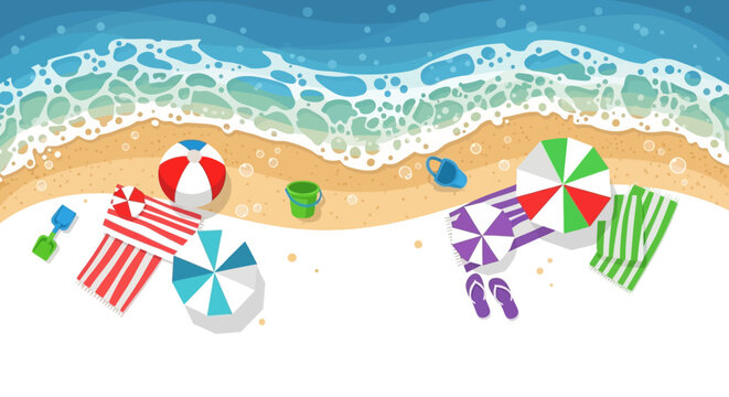 Beach scene with beach balls and umbrellas on sandy shore.