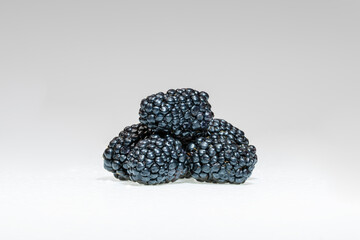 Large Blackberries in a Pile on a White Background