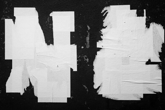 blank, old torn city posters close-up