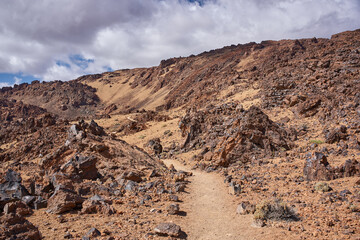 Hiking trail through Minas de San José volcanic landscape