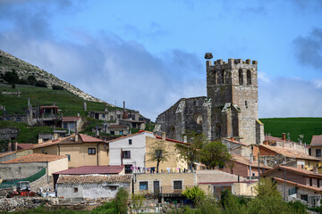 Naklejka premium Church of Santa Eulalia in Palenzuela, Palencia viewed from surrounding village
