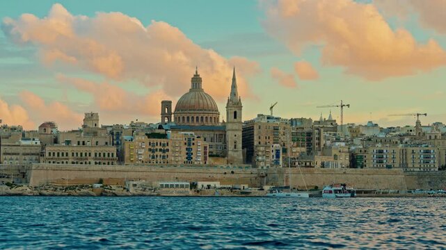View of Valletta's of Capital City of Malta. Marsamxett Harbour with the view on Valletta Saint Paul's Anglican Cathedral