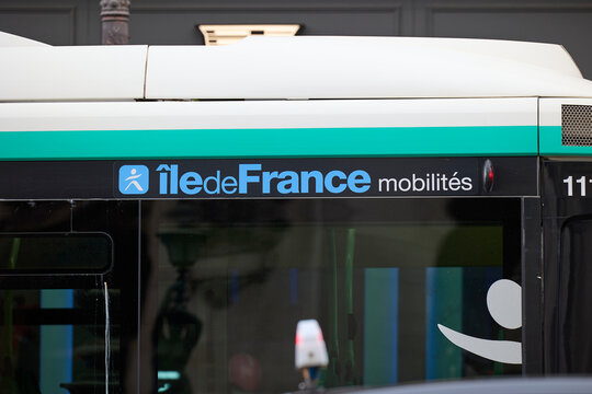 Ile de France Mobilites sign on city bus in Paris. Public transportation system branding in French capital. Paris, France - October 13, 2025.
