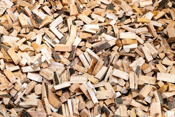 Stacked Firewood Background with Cut Wooden Logs