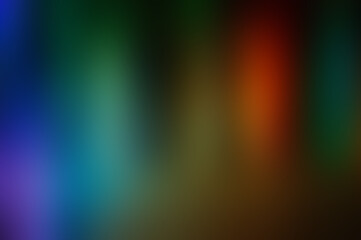 Abstract blurred gradient background with vertical spots of purple, blue, and red.
