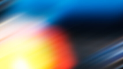 Abstract blurred gradient background with yellow sunburst and blue diagonal spots.