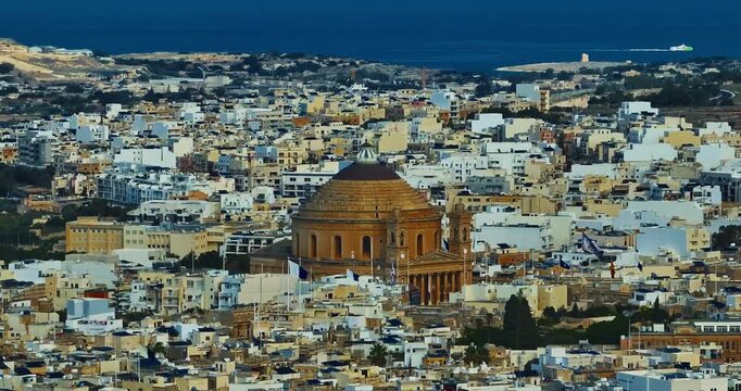 Aerial view of Mosta Church, famous remarkable wartime miracle, architectural landmarks, Malta 