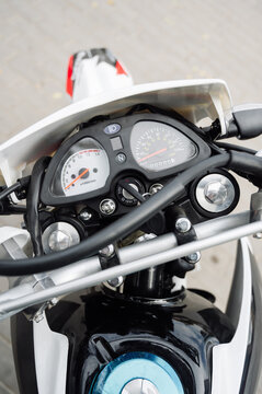 Motorcycle dashboard: speedometer and odometer in detail.