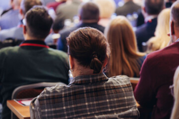 Conference, hall with audience, panel discussion at forum, people on a congress together listen to speaker on stage at convention, plenary session at business lecture seminar, venue for presentation