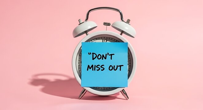 A white retro alarm clock with a blue sticky note reading "Don't Miss Out," pink backdrop