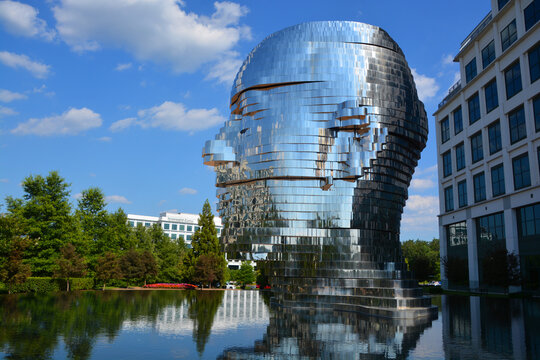 METALmorphosis is a large (7 meters; weighing 13 tons) kinetic sculpture of a human head, by Czech artist David Čern&yacute;. The sculpture is in the Whitehall Corporate Center in Charlotte, North Carolina, 