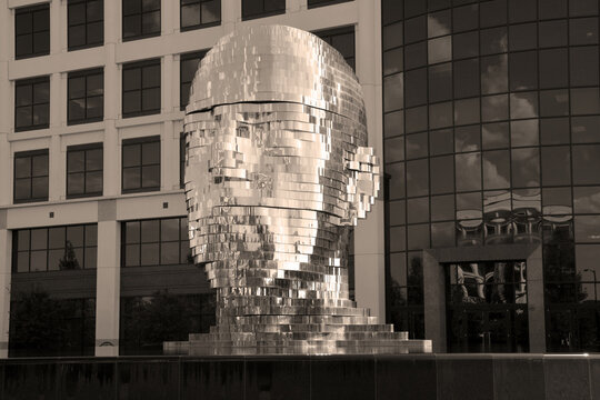 METALmorphosis is a large (7 meters; weighing 13 tons) kinetic sculpture of a human head, by Czech artist David Čern&yacute;. The sculpture is in the Whitehall Corporate Center in Charlotte, North Carolina, 